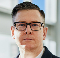 Fotografie Alexander Hughes director executiv al unei firme de tranzacționare criptomonede